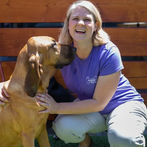 Staff with dog at Bowhaus in Boulder, CO